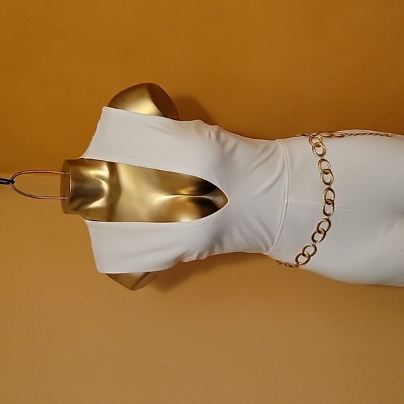LULU'S THINKING OUT LOUD WHITE CUT-OUT JUMPSUIT. SIZE SMALL. - Picture 9 of 11